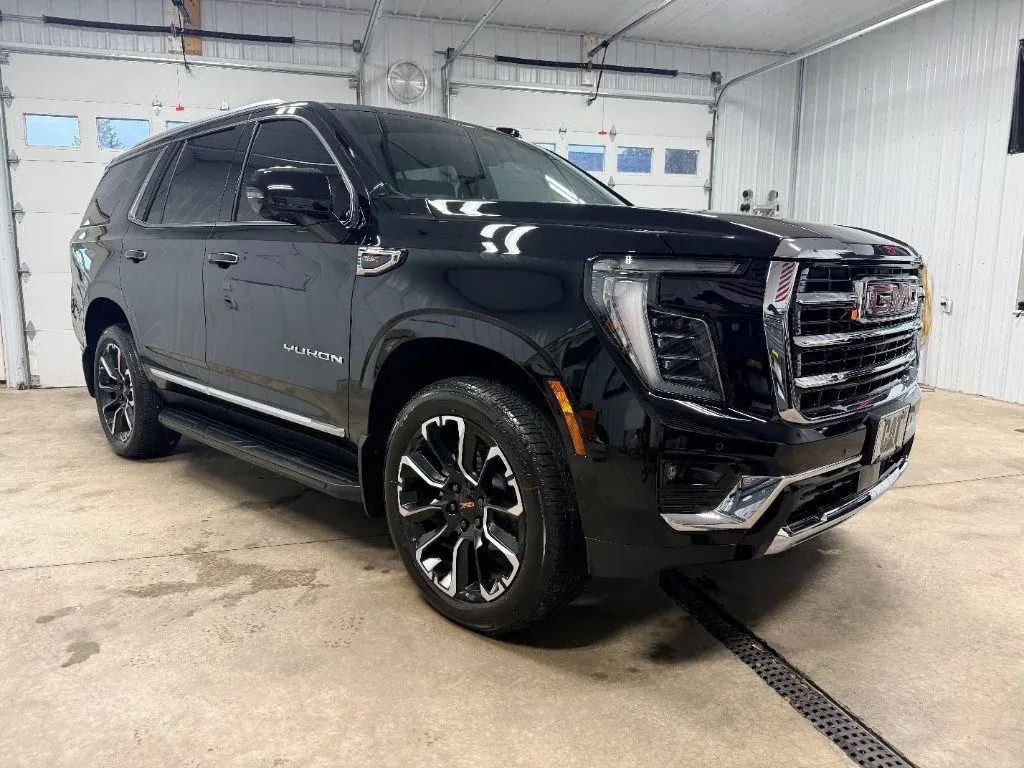 Black GMC Yukon after window tint at Black Label Tint